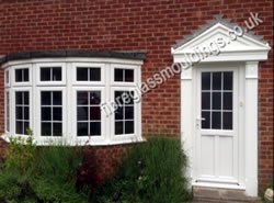 Fluted Door Surround & Apex Canopy